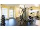 Community fitness center with machines, free weights, and ample space for working out at 2500 Winding Creek Blvd # A104, Clearwater, FL 33761