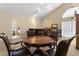 Game room with round table with chairs, large bar area, and large sliding doors at 2500 Winding Creek Blvd # A104, Clearwater, FL 33761