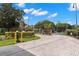 Entrance to the gated community with a stone gatehouse at 2500 Winding Creek Blvd # A104, Clearwater, FL 33761
