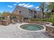 Tranquil outdoor hot tub with stone accents for relaxation and enjoyment at 2500 Winding Creek Blvd # A104, Clearwater, FL 33761
