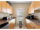 Functional kitchenette equipped with modern appliances and ample cabinet space at 2500 Winding Creek Blvd # A104, Clearwater, FL 33761