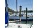 Marina dock featuring sailboats with wooden posts at 319 Boca Ciega Dr, Madeira Beach, FL 33708