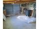Spacious garage with overhead storage and a sturdy door for secure parking at 319 Boca Ciega Dr, Madeira Beach, FL 33708