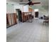 Empty living room with tile flooring and potential for renovation at 319 Boca Ciega Dr, Madeira Beach, FL 33708