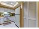 Well-lit kitchen with appliances and ample storage space in a clean and accessible design at 3283 Hilary Cir # 2C, Palm Harbor, FL 34684