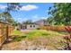 Spacious backyard with a privacy fence, patio and potential for landscaping and outdoor entertaining at 3317 W Iowa Ave, Tampa, FL 33611