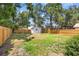 Large backyard with a shed and a wooden fence, perfect for outdoor activities and privacy at 3317 W Iowa Ave, Tampa, FL 33611