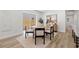 Light dining room with a modern table, chairs, and bright natural lighting at 3317 W Iowa Ave, Tampa, FL 33611