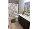 The bathroom features a dark vanity and a shower-tub combo at 3505 Gloria Ave, Plant City, FL 33563