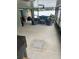 The screened patio is furnished with comfortable seating at 3505 Gloria Ave, Plant City, FL 33563