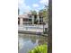 A serene community pool and idyllic tropical landscape, perfect for relaxation and enjoyment at 3840 N Lake Dr # 125, Tampa, FL 33614