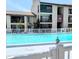 Community pool with clear turquoise water and ample deck space at 3840 N Lake Dr # 125, Tampa, FL 33614