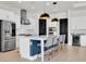 Beautiful kitchen with an island, stainless steel appliances, and dark accents at 3850 Bonfire Dr, Odessa, FL 33556