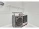 LG washer and dryer set in laundry room with wire shelving overhead at 3850 Bonfire Dr, Odessa, FL 33556