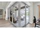 Open patio with a view of outdoor seating area and the pool at 3850 Bonfire Dr, Odessa, FL 33556
