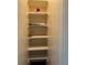 The linen closet features multiple shelves, ideal for plenty of storage space at 4152 56Th N Way # 513, Kenneth City, FL 33709