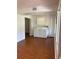 Spacious laundry room includes a washer, dryer, and additional storage cabinets at 4152 56Th N Way # 513, Kenneth City, FL 33709