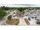 Aerial view of a single-story home with fenced-in yard near landscaped, residential neighborhood at 4902 Murray Hill Drive, Tampa, FL 33615