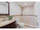 Updated bathroom with stone countertop, mosaic tile accents, and walk-in shower at 4902 Murray Hill Drive, Tampa, FL 33615
