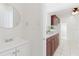 Charming bathroom with sink, mirror, and decorative details at 4902 Murray Hill Drive, Tampa, FL 33615