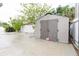 Outdoor shed offering ample storage space in backyard setting at 4902 Murray Hill Drive, Tampa, FL 33615