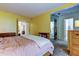 Bedroom with two closets and an open concept leading to the bathroom at 4908 Rockledge Cir, Tampa, FL 33624