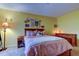 Bedroom features warm and comfortable design with decor and warm lighting at 4908 Rockledge Cir, Tampa, FL 33624