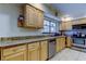 Bright kitchen featuring stainless steel appliances and granite countertops at 4908 Rockledge Cir, Tampa, FL 33624