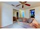Comfortable living area with mirrored closet and view to bathroom at 4908 Rockledge Cir, Tampa, FL 33624