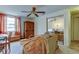 Comfortable living room area with natural light, ceiling fan, and mirrored closet at 4908 Rockledge Cir, Tampa, FL 33624