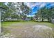 Expansive backyard providing plenty of space for outdoor activities and landscaping opportunities at 4911 Country Aire Ln, Tampa, FL 33624
