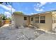 View of the backyard featuring a concrete patio and access door at 5010 8Th N Ave, St Petersburg, FL 33710