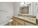 Bathroom featuring a granite countertop vanity and tiled floors at 5010 8Th N Ave, St Petersburg, FL 33710