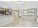 Spacious kitchen and dining area with stainless steel appliances and ample natural light at 5010 8Th N Ave, St Petersburg, FL 33710