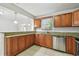 Close up of the kitchen sink and faucet with granite countertops at 5010 8Th N Ave, St Petersburg, FL 33710