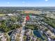 An aerial view of the property shows its location near ponds and green spaces at 5236 Treig Ln, Wesley Chapel, FL 33545