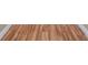 Close up on recently installed and well-maintained hardwood-style flooring at 5236 Treig Ln, Wesley Chapel, FL 33545