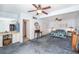 Primary bedroom features vanities with generous closet space, carpeted floors, and ceiling fans at 5250 12Th N St, St Petersburg, FL 33703