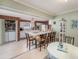 Cozy kitchen with brick accents, breakfast bar, and ample counter space with a view to laundry at 5250 12Th N St, St Petersburg, FL 33703