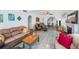 Spacious living room with archways, fireplace, and comfortable seating at 5250 12Th N St, St Petersburg, FL 33703