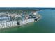 A stunning aerial view showcases the waterfront condo with amazing views of the bay and the Gulf at 5900 Shore S Blvd # 512, Gulfport, FL 33707
