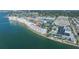 Aerial view of waterfront condos, tennis courts, pools and marina at 5900 Shore S Blvd # 512, Gulfport, FL 33707