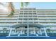 Exterior shot of The Embassy building featuring multiple stories with archways and balconies at 5900 Shore S Blvd # 512, Gulfport, FL 33707