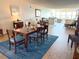 Spacious dining room with stylish furniture and an open layout to the living area at 5900 Shore S Blvd # 512, Gulfport, FL 33707