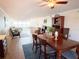 Inviting dining room with wood furniture, rug, and a seamless transition to the living space at 5900 Shore S Blvd # 512, Gulfport, FL 33707