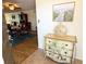 A view of the entryway with decorated vintage chest and an open view of the living and dining areas at 5900 Shore S Blvd # 512, Gulfport, FL 33707