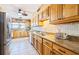 Bright kitchen with granite countertops, stainless steel appliances, and plenty of cabinet space for storage at 5900 Shore S Blvd # 512, Gulfport, FL 33707