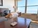 Cozy living room detail with a decorative fish on a wooden table with beautiful natural lighting at 5900 Shore S Blvd # 512, Gulfport, FL 33707