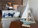 Cozy living room featuring nautical decor and comfortable seating with soft pillows for relaxation at 5900 Shore S Blvd # 512, Gulfport, FL 33707