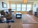 Cozy living room featuring water views and comfortable seating at 5900 Shore S Blvd # 512, Gulfport, FL 33707